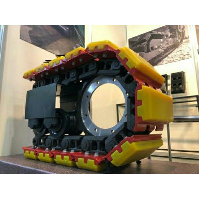 Гусеничные цепи с системой EPS съемной полиуретановой накладкой.